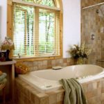 Design of a bathroom in a private Art Deco home with ceramic tiles