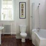 Bathroom design in a private classic house with oak tiles