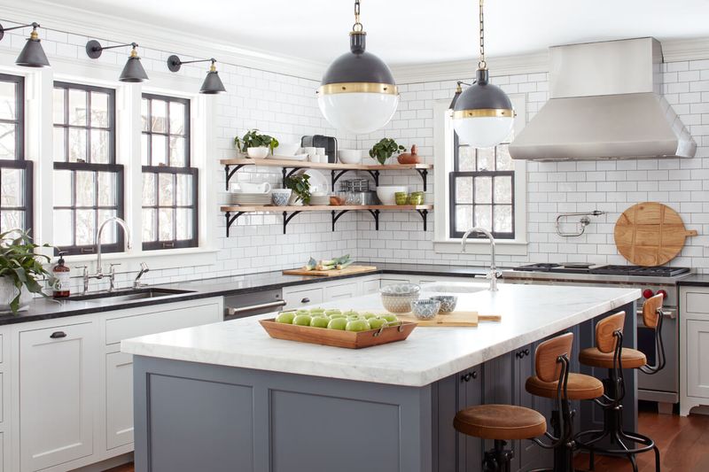 Kitchen design in a private island island dining table combined with washing and cooking