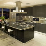 Kitchen design in a private house hood over the island