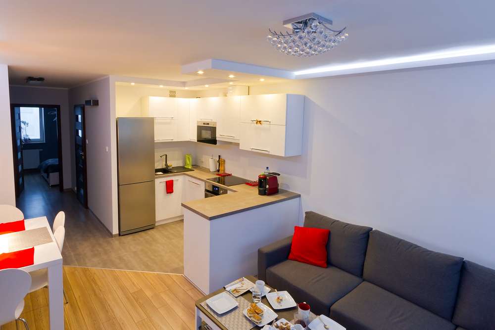 kitchen living room with integrated appliances