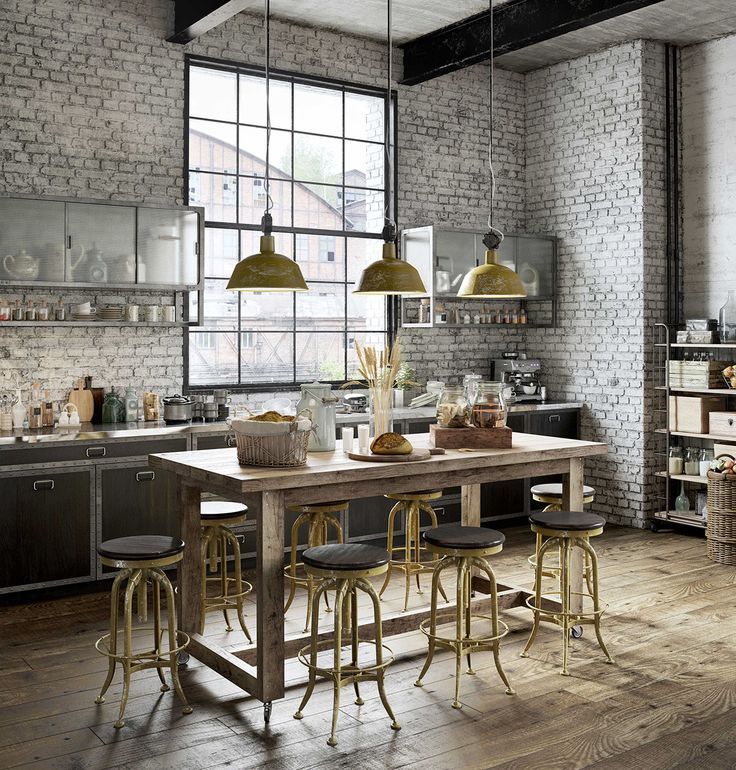 Murs gris et blancs à l'intérieur de la cuisine d'une maison de campagne