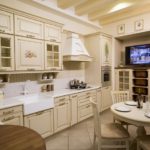 Beige kitchen with decoupage elements.