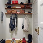 Open shelves in the corridor of a private house