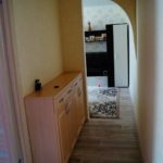 Narrow chest of drawers in the corridor of a panel house