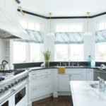 Kitchen furniture in the bay window of a country house