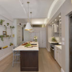 Wall decoration in the kitchen with decorative shelves