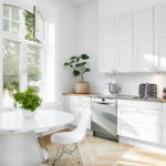 Living plants in the interior of a bright kitchen