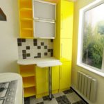 Meuble de cuisine jaune avec comptoir de bar extensible