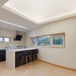 Kitchen with narrow windows in a country house