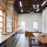 Brick walls in the interior of a modern kitchen