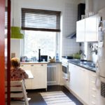 Blinds on the window of a small kitchen