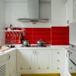 Red apron in a white kitchen