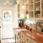 Narrow kitchen with door to the courtyard of a private house