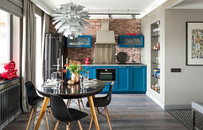 Black dining table in the loft style kitchen