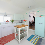 Small rustic kitchen with large but rare pattern wallpaper