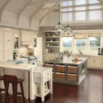 Spacious kitchen with a breakfast bar and a provence island