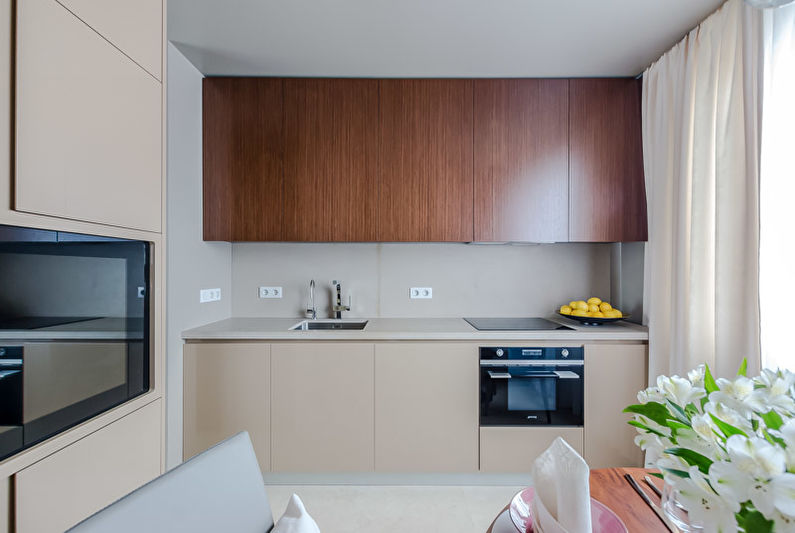 Light curtains on the window of the kitchen in modern style