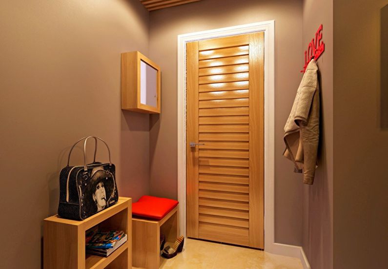 Light brown furniture in the design of the hallway