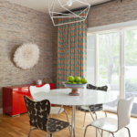 Fabric wallpapers create a special cozy atmosphere in the kitchen