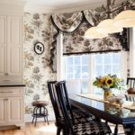 In this kitchen, the wallpaper exactly repeats the floral pattern of the textile that was used to design the bay window.