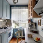 The interior of a narrow kitchen in a private house