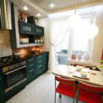 Red chairs in front of the dining table