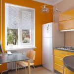 Yellow walls in the interior of the kitchen