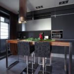 Kitchen interior with dark furniture