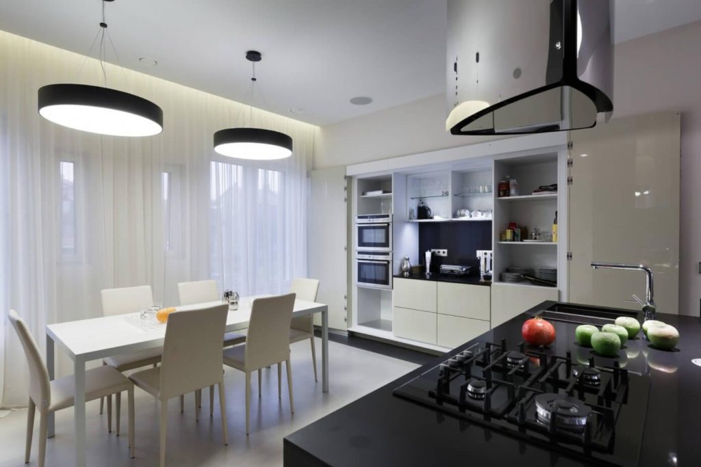 Pendant lights above the dining area