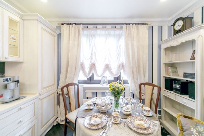 The interior of a small kitchen-dining room in brick stalin