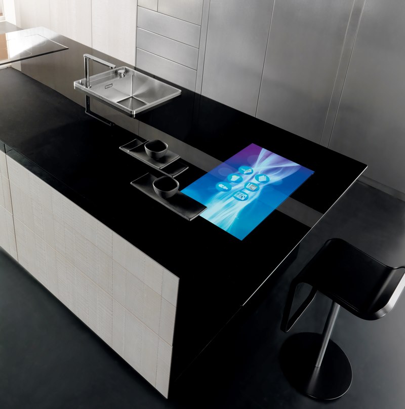 Black worktop with touchscreen in a high-tech kitchen