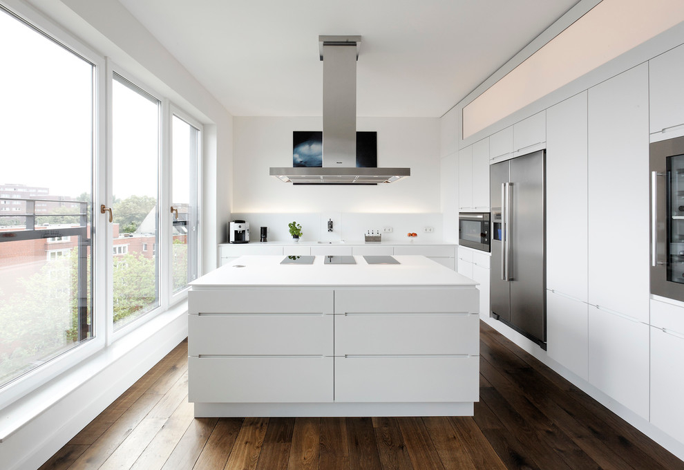 Wood floor in white high-tech kitchen