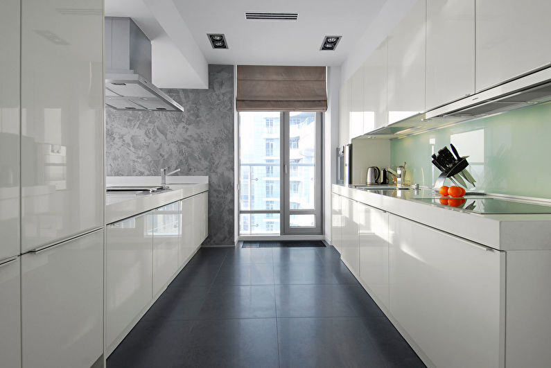 Dark ceramic tile floor in double row kitchen