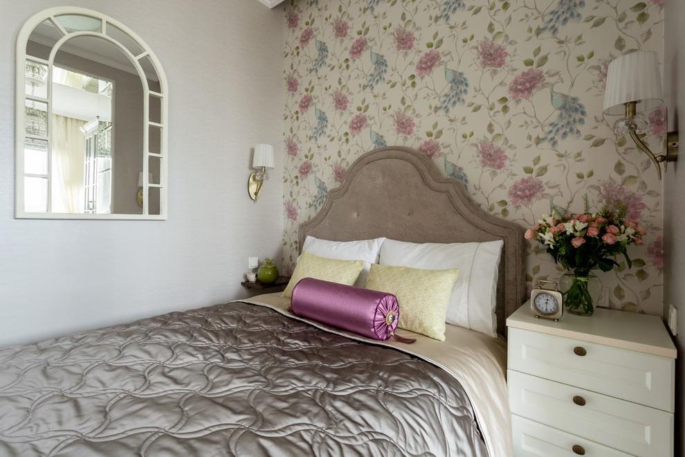 Mirror over the bed in a rustic bedroom