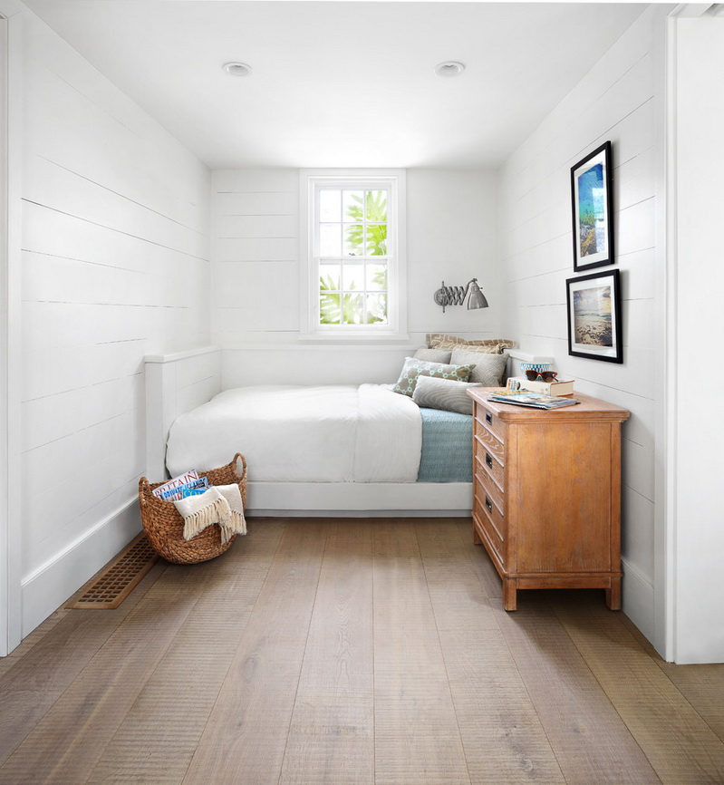 Wooden chest of drawers in a small bedroom