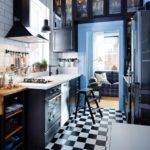 Chess tile laying on the floor of the kitchen working area