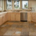 stone tiles on the kitchen floor in the cottage