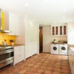 Yellow tile in a white kitchen