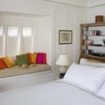 Wooden shelving in the bedroom of a rural house