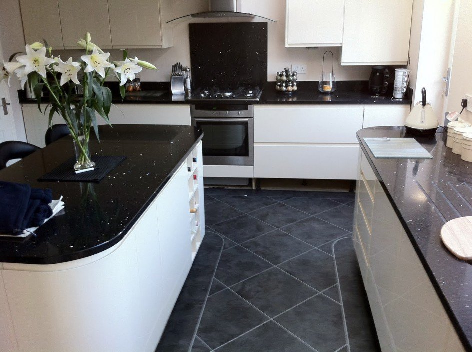 Dark porcelain tile on the kitchen floor