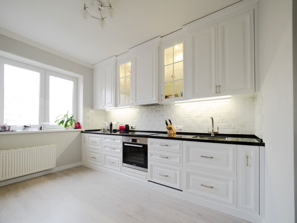 Linear kitchen with matt white facades