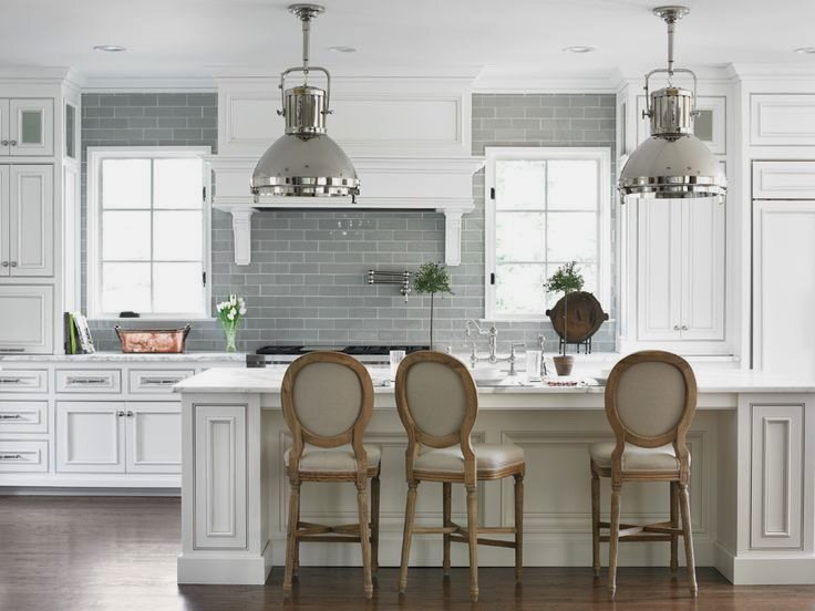 Wooden chairs in the white kitchen