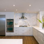 Recessed lights on the ceiling of the kitchen