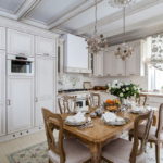 Wooden table in the country style kitchen