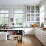 The interior of the kitchen-dining room in white