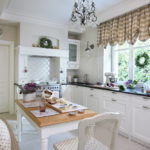 Wooden furniture in the interior of the kitchen in a private house