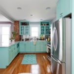 Turquoise rug on the kitchen floor