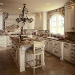 Black chandelier over the kitchen island