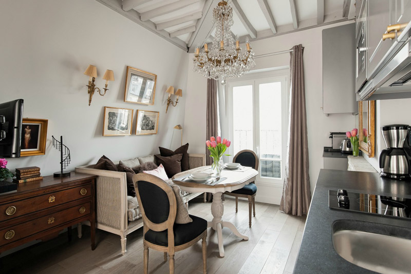 Oval dining table next to the sofa